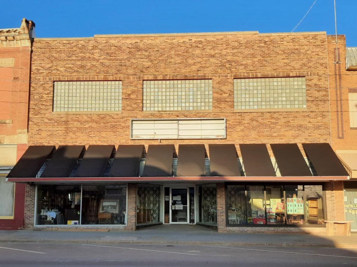 fabric panels added to metal awning